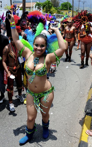 Winston Sill / Freelance Photographer
Carnival is about the costumes and about having fun. Just ask this cheering fan at Sunday's Bacchanal Jamaica Carnival Road Parade.







, held on Sunday May 1, 2011.