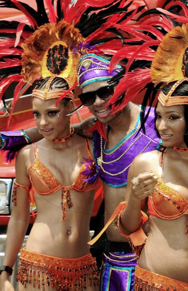 Winston Sill / Freelance Photographer
This gentleman has all the luck, as he finds himself between beauty and more beauty.






Bacchanal Jamaica Carnival Road Parade, held on Sunday May 1, 2011.