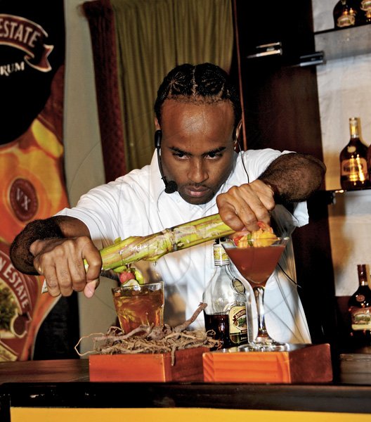 Winston Sill / Freelance Photographer
J. Wray and Nephew Limited  presents the Grand Final for the 2012 Appleton Estate Jamaica Rum Bartender Challenge, held at Knutsford Court Hotel, Ruthven Road on Friday night September 7, 2012. Here is Cleverton Little who was third.