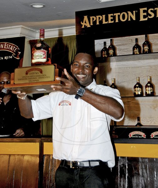 Winston Sill / Freelance Photographer
J. Wray and Nephew Limited  presents the Grand Final for the 2012 Appleton Estate Jamaica Rum Bartender Challenge, held at Knutsford Court Hotel, Ruthven Road on Friday night September 7, 2012. Here is the winner Ryan Mitto.