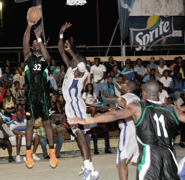 Winston Sill/Freelance Photographer
Spanish Town Spartans' Adrian Forbes (left) dunks over Urban Knights' Nagash Cockburn (centre) during game one of the best-of-three finals in the Flow/National Basketball League on Friday at the National court. The Knights won 77-75 in triple overtime. Andre Murray (right) of Urban Knights and Spartans' Damion Johnson look on. 



Winston Sill/Freelance Photographer
Flow/National Basketball League (NBL) finals double-header, played at the National Stadium Court on Rriday night August 16, 2013.
