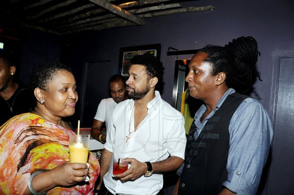 Winston Sill / Freelance Photographer
Tracks and Records in association with Red Stripe presents the Behind The Screen Series featuring Richie Spice, held at Tracks and Records, Market Place, on Tuesday night October 30, 2012. Here are Sharon Burke (left); Orville "Shaggy' Burrell (centre); and Spanner Banner (right).