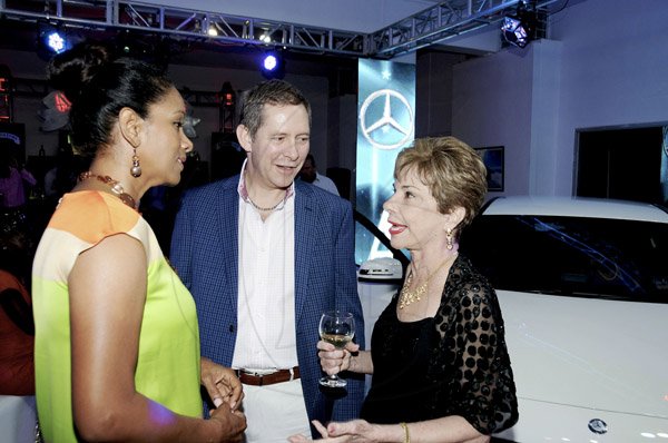 Winston Sill / Freelance Photographer
Silver Star Motors host Reception to launch new A-Class  Mercedes-Benz, held at South Camp Road on Friday night April 12, 2013. Here are Suzann Bowen (left); Bruce Bowen (centre); and Diana Stewart (right).