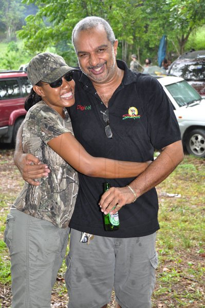 Janet Silvera Photo
Stacye Ingram and Junior Taylor nicely camoflagued at bird bush in Irwin, St. James last Sunday at the start of the bird shooting season.