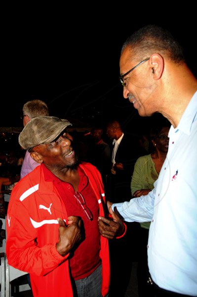 Winston Sill / Freelance Photographer
The Embassy of the United States of America presents Blues on The Green featuring 'Traces of Blue', held at Emancipation Park, New Kingston on Friday night February 22, 2013. Here are Jimmy Cliff (left); and Rev.---??,(Th US Ambassador's husband) right.