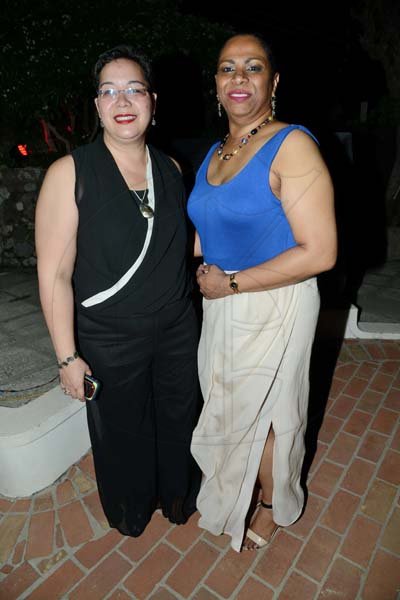 Rudolph Brown/Photographer
 Scotiabank's Patsy Latchman-Atterbury, (right) pose with Shelley Sykes-Coley at a dinner in honour of Bruce Bowen hosted by the Chairwoman of the Bank's board, Mrs. Sylvia Chrominska and the Head of International Banking in Toronto at Tavistock Terrace in Jack's Hill on Wednesday, August 28, 2013