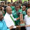 Rudolph Brown/Photographer
From left are Rev Carl Johnson Chairman of Calabar,  Principal of Calabar High, Albert Corcho, Calabar High School captain and star performer, Michael O’Hara and Carlo Redwood, Vice President of Marketing at LIME at the Calabar high school celebration at the school after their victory on Saturday at champs, March 28, 2015.