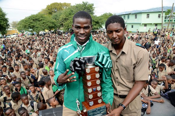 Rudolph Brown/Photographer
Calabar High School captain and star performer, Michael O’Hara, (left) and Seanie Selvin holding trophy at the Calabar high school celebration at the school after their victory on Saturday at champs, March 28, 2015.
Calabar high school celebrates at the school after their victory on Saturday at champs, March 28, 2015.