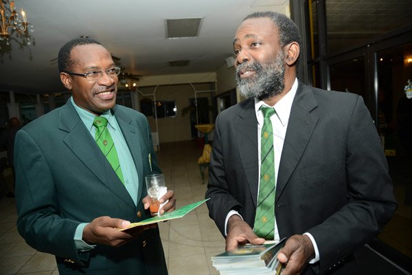 Rudolph Brown/Photographer
Past President John Messam, (right) chat with Alrick Moodie, Vice Principal at the Calabar Old Boys Annual Reunion Dinner at the Mona Visitors Lodge on Saturday, October 5, 2013