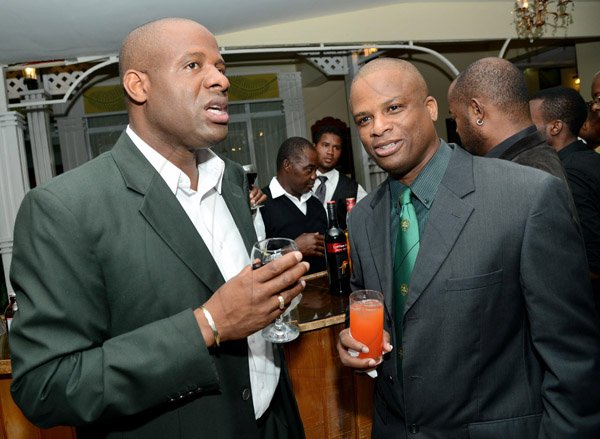 Rudolph Brown/Photographer
 Nehemiah Perry, (left) chat with Orville Brown at the Calabar Old Boys Annual Reunion Dinner at the Mona Visitors Lodge on Saturday, October 5, 2013