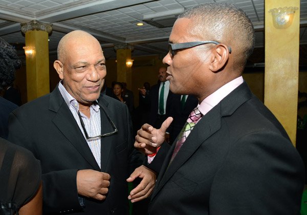 Rudolph Brown/Photographer
St Elmo Whyte, (left) chat with George Roper at the Calabar Old Boys Annual Reunion Dinner at the Mona Visitors Lodge on Saturday, October 5, 2013