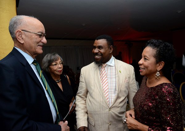 Winston Sill/Freelance Photographer
The 12th Annual Caribbean Hall of Fame Awards for Excellence 2014 function, held at the Jamaica Pegasus Hotel, New Kingston on Saturday night October 25, 2014. Here are Mike Fennell (left); Peggy Fennell (second left); Garnett Reid (second right); and Christine Norton (right), Director and Representative, UNESCO Caribbean Cluster.