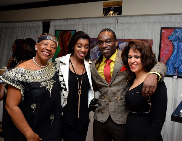Winston Sill/Freelance Photographer
The 12th Annual Caribbean Hall of Fame Awards for Excellence 2014 function, held at the Jamaica Pegasus Hotel, New Kingston on Saturday night October 25, 2014. Here are Amina Blackwood Meeks (left); Dana Edwards (second left); Bill Edwards (second right); and Cheryl Robinson (right).