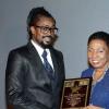 Winston Sill/Freelance Photographer
Beenie Man is presented with his Caribbean Hall of Fame award by Olivia 'Babsy' Grange. 
The 12th Annual Caribbean Hall of Fame Awards for Excellence 2014 function, held at the Jamaica Pegasus Hotel, New Kingston on Saturday night October 25, 2014.