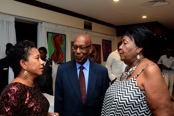 Winston Sill/Freelance Photographer
The 12th Annual Caribbean Hall of Fame Awards for Excellence 2014 function, held at the Jamaica Pegasus Hotel, New Kingston on Saturday night October 25, 2014. Here are Christine Norton (left), Director and Representative, UNESCO Caribbean Cluster; Winston Bayley (centre), Consul for Barbados;  and Merline Daley (right).