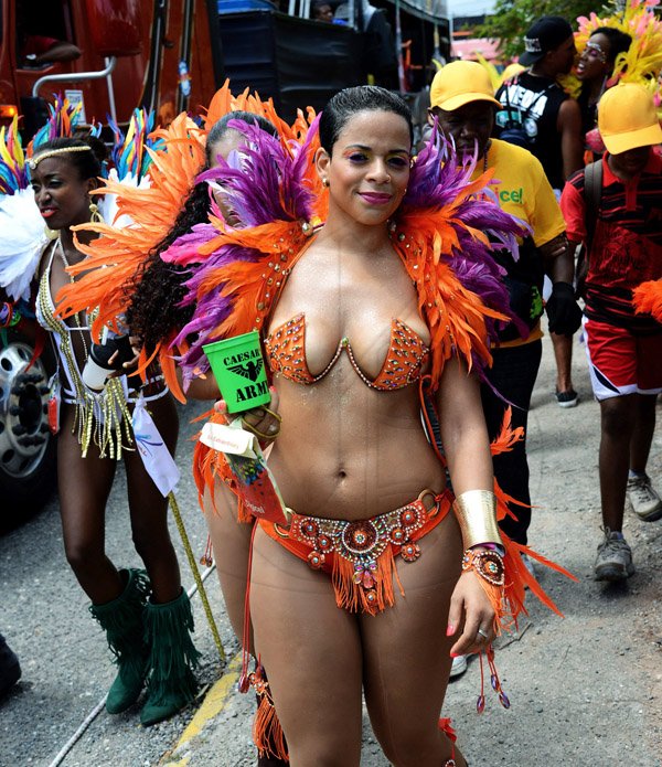 Winston Sill/Freelance Photographer
Bacchanal Jamaica Road Parade, from Mas Camp, Stadium North to Half Way Tree and back, held on Sunday April 27, 2014. Here ais Sara Lawrence (left); and her friend.