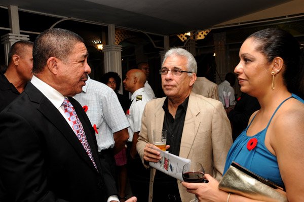 Winston Sill/Freelance Photographer
Caribbean Aviation Training Centre (CATC) Graduation and Awrds Dinner, held at the Mona Visitors' Lodge, Garden Lane, UWI Mona Campus on Saturday night October 12, 2013. Here are Capt. Lloyd Tai (left), Fly Jamaica;  Dr. Richard Gomes (centre); and Nadine Silvera (right).