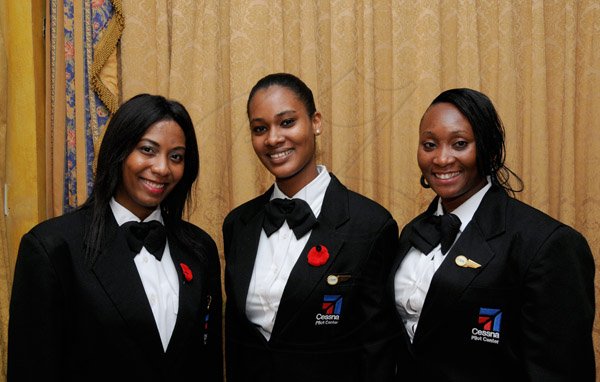 Winston Sill/Freelance Photographer
Caribbean Aviation Training Centre (CATC) Graduation and Awrds Dinner, held at the Mona Visitors' Lodge, Garden Lane, UWI Mona Campus on Saturday night October 12, 2013. Here are Tanisha Clover (left); Rushane Ramnal (centre); and Venice Webley (right).