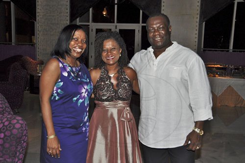 Janet Silvera Photo
 
Birmingham, England-based attorney, Dawn Fenton-Brathwaite (left), her husband Terrence and law school classmate Jewel Scott, former district attorney, Clayton County, Georgia were out to celebrate with Williams.


 at a cocktail reception celebrating the life of Belizean Queens Council, Rodwell Williams, who was shot and left to die last year in Belize. The reception was held at the Iberostar Suites in Montego Bay last Saturday night.