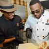Rudolph Brown/Photographer
Agent Sasco, (left) and Chef Brian Lumley cooks at the Best Dressed Chicken Caters to you Celebrity Style  at the Montego Bay Convention Centre on Sunday, October 13, 2013
