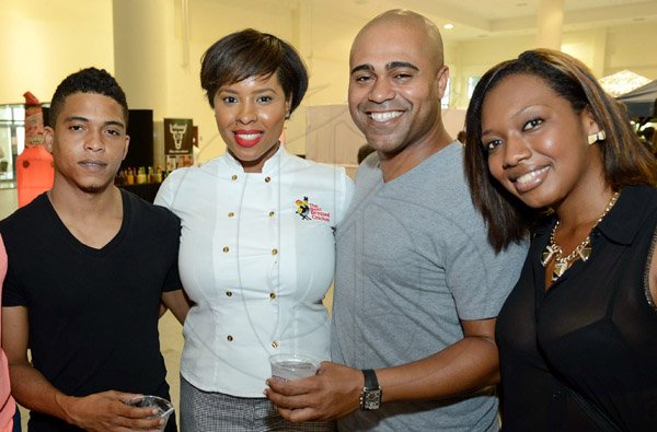 Rudolph Brown/Photographer
Nikolette Williams, (second left) of Best Dressed pose with from left Darren Freekleton, Joel Ryon and Heather Effs at the Best Dressed Chicken Caters to you Celebrity Style cook off with Agent Sasco and Chef Brian Lumley at the Montego Bay Convention Centre on Sunday, October 13, 2013