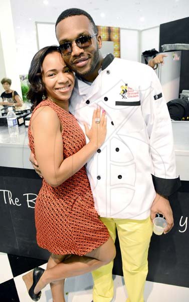 Rudolph Brown/Photographer
Agent Sasco ( Jeffrey Campbell ) pose with his beautiful wife Nicole  McLaren Campbell at the Best Dressed Chicken Caters to you Celebrity Style cook off  with Agent Sasco and Chef Brian Lumley at the Montego Bay Convention Centre on Sunday, October 13, 2013