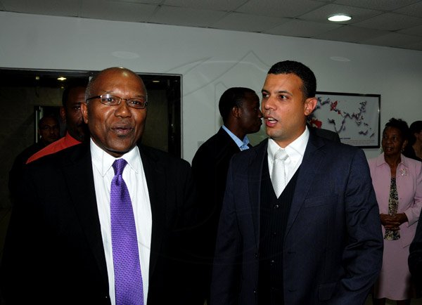 Winston Sill / Freelance Photographer
Function to mark the Official Launch of CEMEX Jamaica Limited new Corporate Office, held at the Courtleigh Corporate Centre, St. Lucia Avenue, New Kingston on Wednesday night February 20, 2013. Here are Dr. Morais Guy (left); and Rafael Villalona (right), General Manager, CEMEX Jamaica Limited.