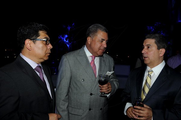 Winston Sill / Freelance Photographer
Function to mark the Official Launch of CEMEX Jamaica Limited new Corporate Office, held at the Courtleigh Corporate Centre, St. Lucia Avenue, New Kingston on Wednesday night February 20, 2013. Here are Gerardo Lozano (left), Mexican Ambassador; Dr. Jose Tomas German (centre), Dominican Republic Ambassador; and Dennis Valdez (right), Managing Director, Fersan.
