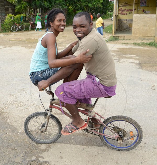 Ian Allen/Photographer
this couple was on a Joy ride through the Community of  Hartford in Westmoreland during the By-Election on December 1st 2014.