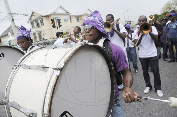 Norman Grindley/Chief Photographer
Kingston College, high school family march along South Camp road to the National Stadium in support of their school at champs in Kingston.