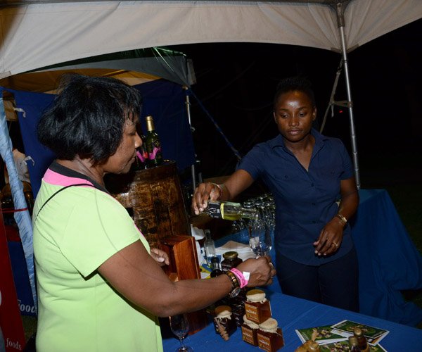Winston Sill/Freelance Photographer
Chefs On Show annual fundraising event, held at the Jamaica Pegasus Hotel, New Kingston on Wednesday April 9, 2014. Here are Marilyn Bennett (left); and Trudy Landley-Nelson (right) of Ecofarms, producers of Gourmet Honey Products.