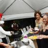 Rudolph Brown/Photographer
Chef Shony Abbott give a taste to from left Michelle Belnavis, Nikeisha Boothe and Kimberley at the Chefs on Show event at 15 Paddington Terrace in Kingston on Wednesday, June 13-2012