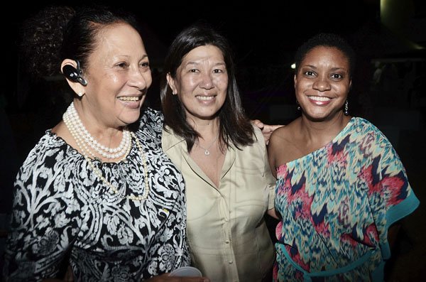 Rudolph Brown/Photographer
Chef Lorraine Fung, (left) pose with Joan Forrest Henry, (right) Divisional Sales and Marketing Manager of Best Dres Chicken and Navinia Lue at the Chefs on Show event at 15 Paddington Terrace in Kingston on Wednesday, June 13-2012