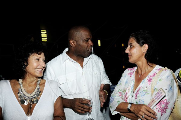 Winston Sill / Freelance Photogra
Chester Francis Jackson Birthday Party, held at Spanish Court Hotel, St. Lucia Avenue, New Kingston on Sunday  night August 26, 2012. Here are Jennifer Lym (left); Gregg Christie (centre); and Celsa Nuno (right), Spanish Ambassador.