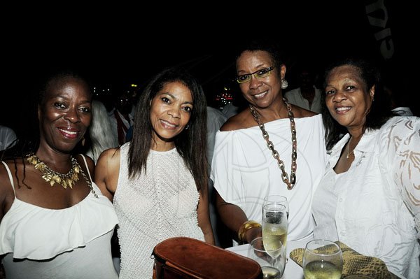 Winston Sill / Freelance Photogra
Chester Francis Jackson Birthday Party, held at Spanish Court Hotel, St. Lucia Avenue, New Kingston on Sunday  night August 26, 2012. Here are Christine King (left); Jenny Berry (second left); Maureen Shaw (second right); and Dawn Watson (right).