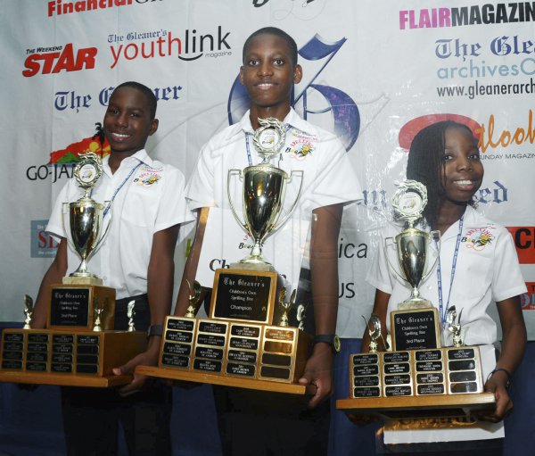 Ian Allen/Photographer
Top three finishers in the 2013 Gleaner Spelling Bee championship Christian Allen centre, winner from Ardenne High in St.Andrew, Stephen Nelson left, Glenmuir High and Clarendon place second and Chaunte Blackwood right of Wolmer's Preparatory and Kingston who placed third. The championship was held at the Jamaica Pegaus otel in Kingston on Wednesday.