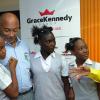 Ian Allen/Photographer
Errol Miller right, of  Lime, talks about Child Month with Douglas Orane second left, Patron of Child Month and Chairman of Grace Kennedy Limited and Student from Vauxhall High School, from left, Tatyana Reid, Marion Levels and Billinda Geohaghan during the Media Launch of Child Month 2013 at Grace Kennedy Head Offices in Kingston on Wednesday.