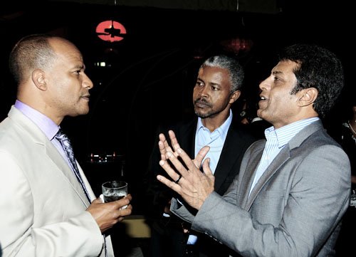 Winston Sill / Freelance Photographer
The Chairman of Jamaica Public Service Company (JPS)  Hisatsugu Hirai host Chinese New Year's Reception, held at Plymouth Close, St. Andrew on Tuesday night January 24, 2012. Here are National Security Minister Peter Bunting (left); Sam Davis (centre); and Sangeet Dutta (right).