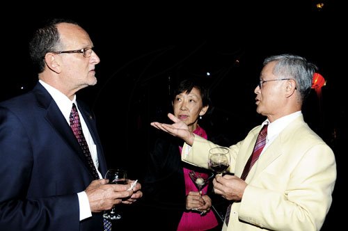 Winston Sill / Freelance Photographer
The Chairman of Jamaica Public Service Company (JPS)  Hisatsugu Hirai host Chinese New Year's Reception, held at Plymouth Close, St. Andrew on Tuesday night January 24, 2012. Here are Gregory Mair (left); and Japanese Ambassador Hiroshi Yamaguchi and his wife Yoko.