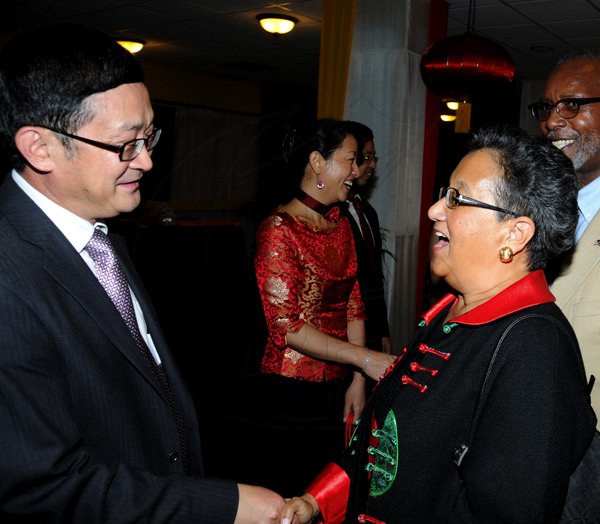 Winston Sill / Freelance Photographer
Chinese Ambassador Qingdian Zheng host China National Day Reception, held at the Jamaica Pegasus Hotel, New Kingston on Wednesday night September 26, 2012. Here are Ambassador Zheng (left); Lei Liu (centre); and  Fay Pickersgill (right).