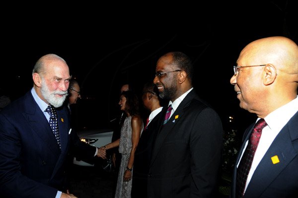 Winston Sill / Freelance Photographer
Christopher  Issa and wife Kimberly host Receptioin for visiting Prince Michael of Kent, held at Montrose Road on Wednesday night April 16, 2013. Here are Prince Michael (left0; Earl Jarrett (second right); and Governor General Sir Patrick Allen (right).
