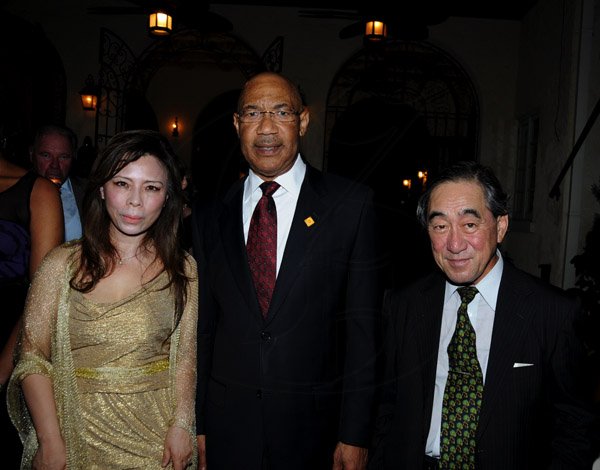 Winston Sill / Freelance Photographer
Christopher  Issa and wife Kimberly host Receptioin for visiting Prince Michael of Kent, held at Montrose Road on Wednesday night April 16, 2013. Here are Sayoko Takase (left); Governor General Sir Patrick Allen (centre); and Yasuo Takase (right), Japanese Ambassador.