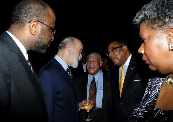 Winston Sill / Freelance Photographer
Christopher  Issa and wife Kimberly host Receptioin for visiting Prince Michael of Kent, held at Montrose Road on Wednesday night April 16, 2013. Here are Earl Jarrett (left); Prince Michael (second left); Yvon?? Desulme (centre); Minister Anthony Hylton (second right); and Carrole Guntley (right).