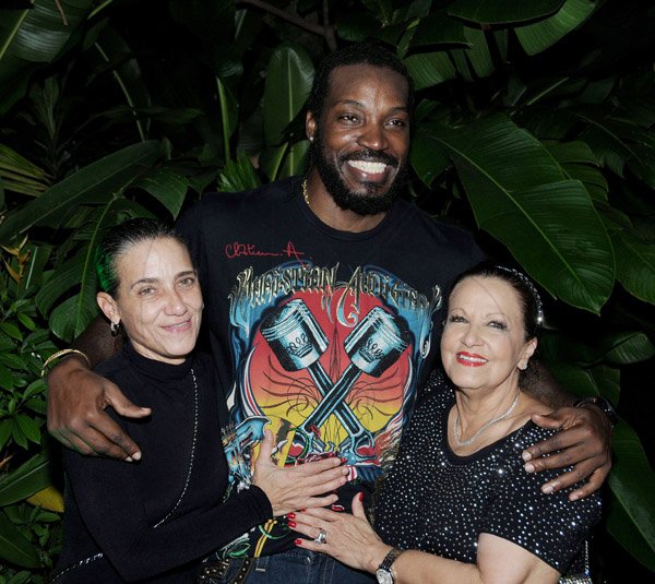 Winston Sill/Freelance Photographer
Christelle Harris 30th Birthday Party, held at Terra Nova All-Suite Hotel, Waterloo Road on Thursday night June 20, 2013. Here are Angie Harris (left); Chris Gayle (centre); and Ruth Hussey (right).