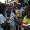 Norman Grindley/Chief Photographer
Vendors making a sale on Beckford Street downtown Kingston, Christmas in the city shopping.
