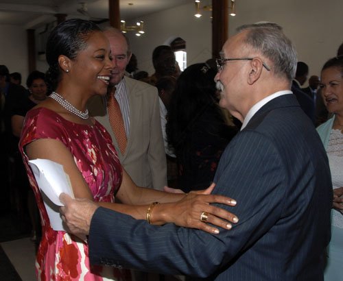 Ian Allen /  Photographer
Marlene Malahoo-Forte left greets Noel Martinez Ochoa right, Ambassador of the Bolivarian Republic of Venezuela during the Service in Observance of Diplomatic Week 2012 in celebration of the 50th Anniversary of Jamaica Independence and the 30th Anniversary of the Opening for Signiture of the United Nations Convention on the Law of the Sea.(UNCLOS) The church service was held at the University Chapel, University of the West Indies, Mona on sunday.