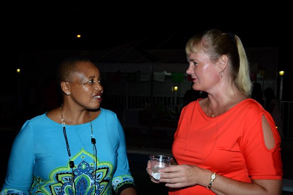 Winston Sill/Freelance Photographer
Latin American Women's Club (LAWC) host  Cinco de Mayo  Mexican Celebration Party, held at Cherry Garden Avenue on Saturday night May 3, 2014. Here are Mathu Joyini (left), South African High Commissioner; and Helene Hagen-Larsen (right).