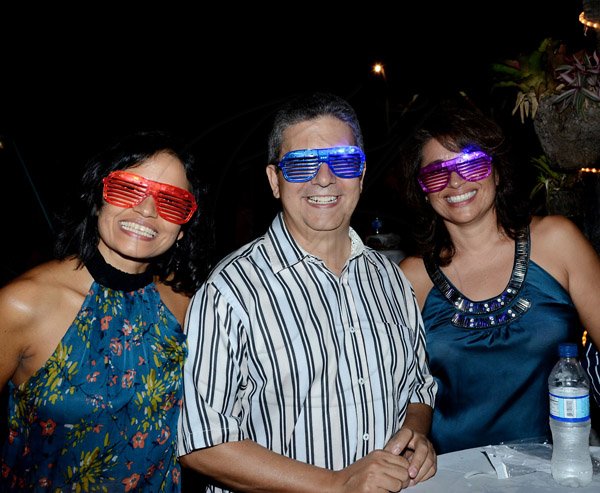 Winston Sill/Freelance Photographer
Latin American Women's Club (LAWC) host  Cinco de Mayo  Mexican Celebration Party, held at Cherry Garden Avenue on Saturday night May 3, 2014. Here are Yelitza Infante (left); Dennis Valdez (centre); and Jenny Aguilao (right).
