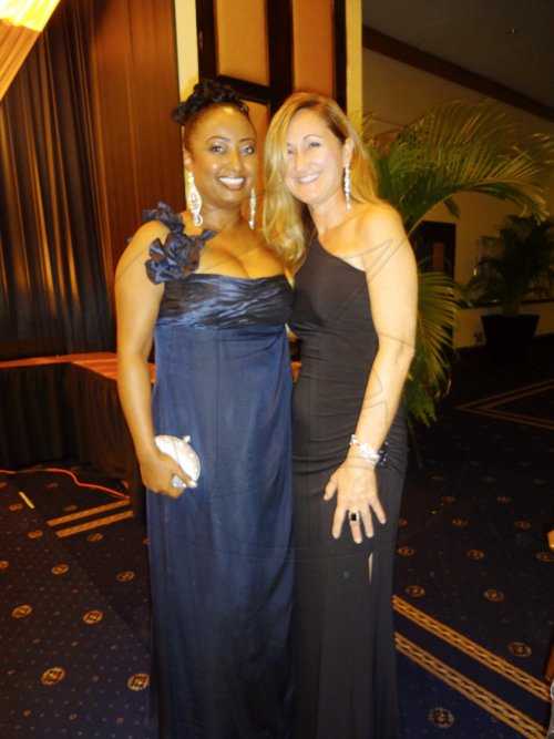 Barbara Ellington/Lifestyle Editor
Yodit Hylton (left), poses with Patricia Rutter at Saturday night's Civil Aviation Authority Awards Dinner.


********************************************************************** on Saturday December 10, 2011 at the Pegasus Hotel.