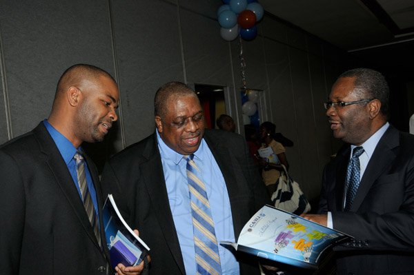 Winston Sill/Freelance Photographer
BUSINESS DESK:----C&WJ Co-operative Credit Union Limited 49th Annual General Meeting, held at the Jamaica Pegasus Hotel, New Kingston on Tuesday evening May 14, 2013. Here are Kevin Gooden (left), Assistant Treasurer; David Hall (centre), President; and Barrington Whyte (right), General Manager.